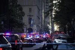 At least 2 people shot at Manhattan office building housing financial firms and NFL, AP source says